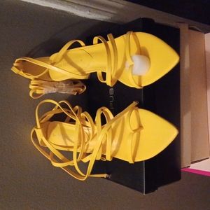 Yellow strappy heels